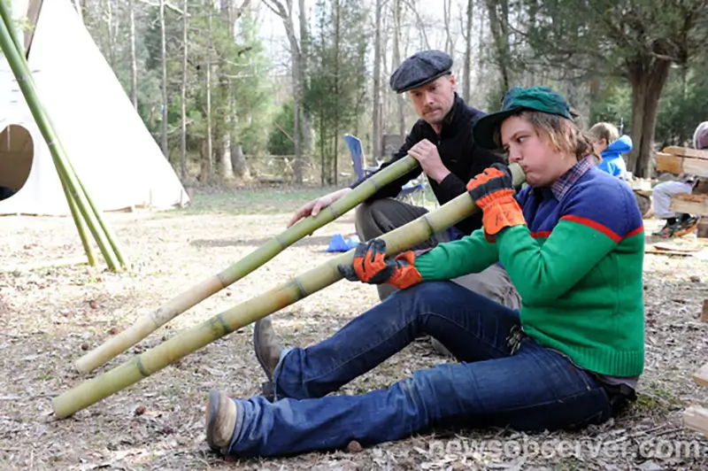 Fuz Sanderson teachers someone to play didgeridoo