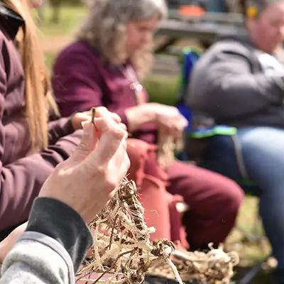 hand weaving kudzu baskets